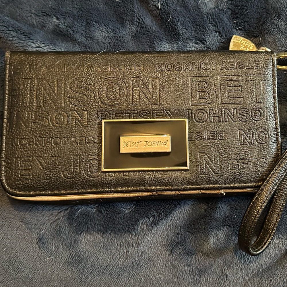 Good condition Betsey Johnson spell out XOX Black Embossed Wristlet wallet